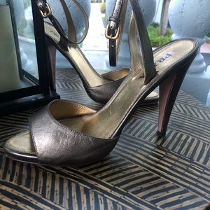 Prada 5” heels in gold leather. Minor use.